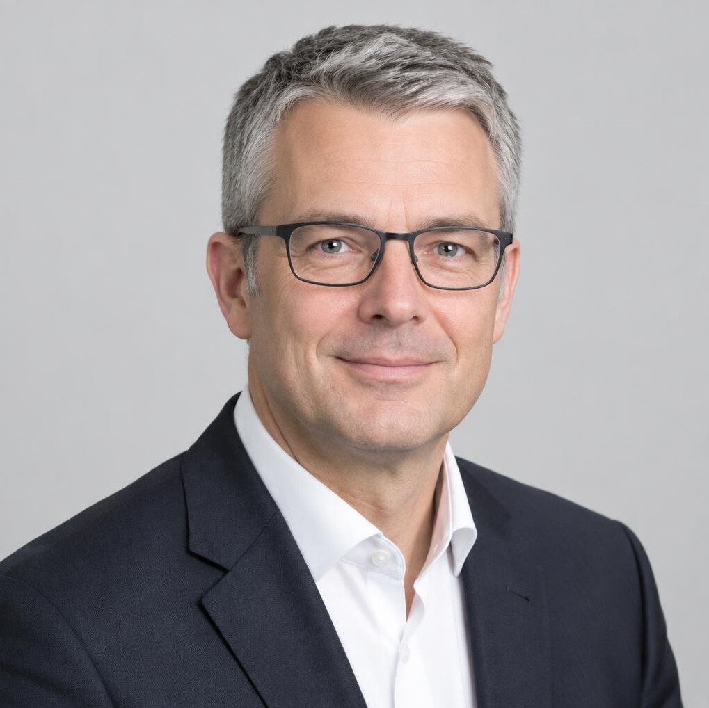 Studio portrait of a businessman with glasses
